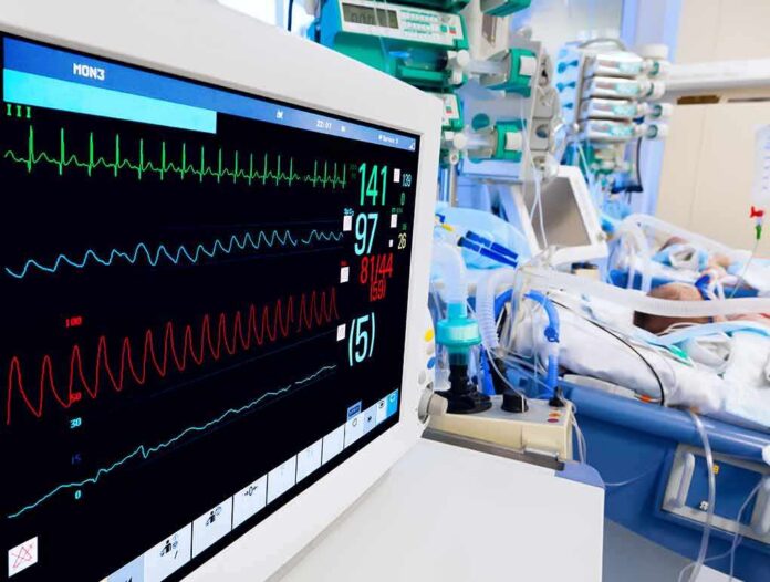 shutterstock_138153896 Hospital bedside monitor displaying vital signs in an ICU