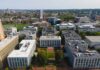 aerial view of a university campus quad with surrounding academic buildings