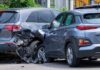 Two SUVs in a side-impact collision on a city street