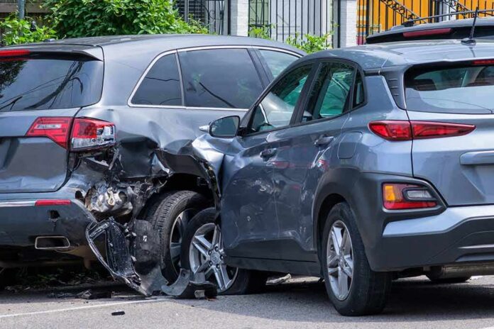 shutterstock_2022747632 Two SUVs in a side-impact collision on a city street