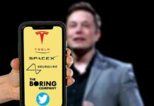 Musk’s $10B Kid Giveaway? smartphone showing multiple tech company logos with blurred speaker in background